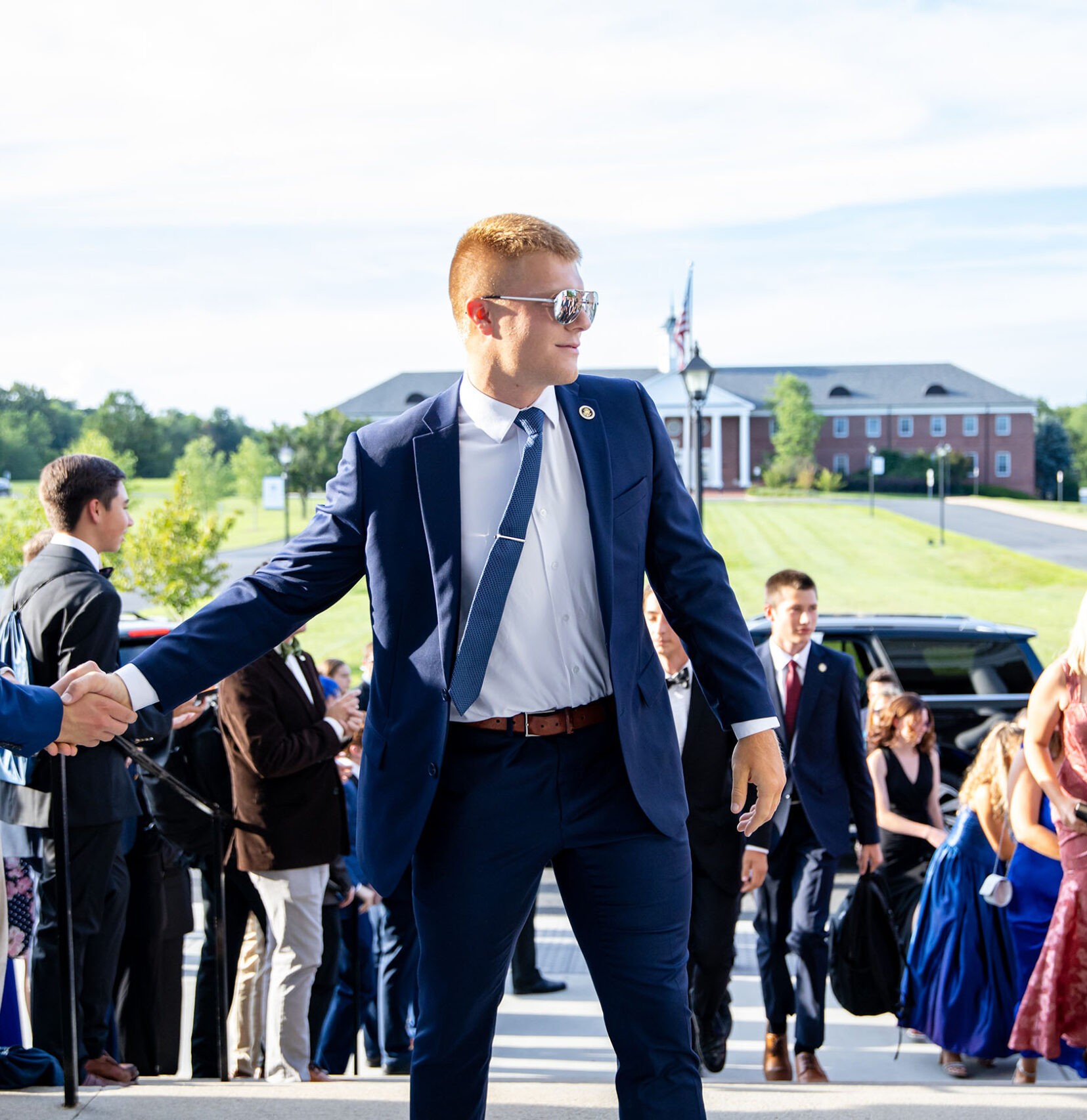 Students at outdoor formal event